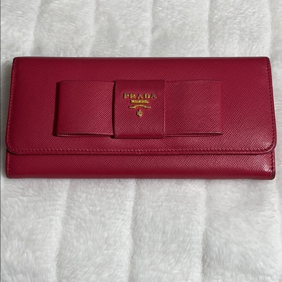 Prada Handbags - Prada Bow Flap Wallet Saffiano Leather